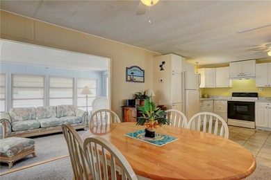 Cute and cozy fully furnished home offering relaxed on Barefoot Bay Golf Course in Florida - for sale on GolfHomes.com, golf home, golf lot