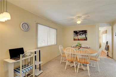 Cute and cozy fully furnished home offering relaxed on Barefoot Bay Golf Course in Florida - for sale on GolfHomes.com, golf home, golf lot