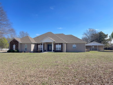 Check out this beautiful custom built home in Manila, AR. This on Big Lake Country Club in Arkansas - for sale on GolfHomes.com, golf home, golf lot