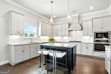 Welcome to this beautifully designed 5-bedroom, 4-bath home on Canongate At Heron Bay in Georgia - for sale on GolfHomes.com, golf home, golf lot