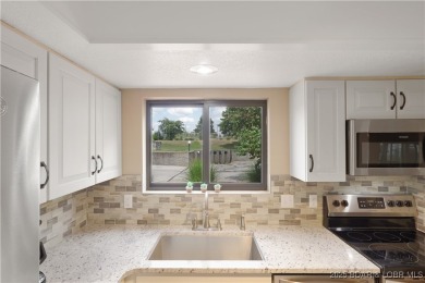 Updated Walk-In Level Unit - NO STEPS! Spacious 2 bedroom, 2 on Seasons Ridge At Four Seasons in Missouri - for sale on GolfHomes.com, golf home, golf lot