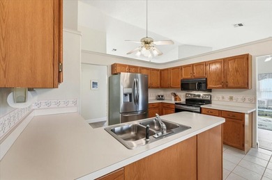 Experience refined Florida living in this beautifully appointed on Sandpiper Golf Club in Florida - for sale on GolfHomes.com, golf home, golf lot