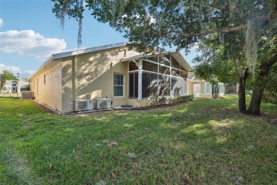 Pride of ownership can be seen in this home with 2 bedrooms plus on Ridgewood Lakes Golf and Country Club in Florida - for sale on GolfHomes.com, golf home, golf lot