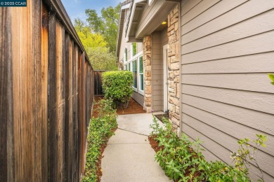 Located in the desirable Oak Hollow subdivision, this updated on Oakhurst Country Club in California - for sale on GolfHomes.com, golf home, golf lot
