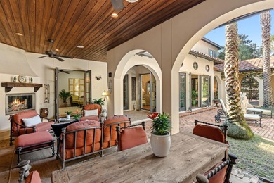 Tucked behind beautiful, private gates on a desirable corner lot on Sandestin Golf and Beach Resort - Raven in Florida - for sale on GolfHomes.com, golf home, golf lot