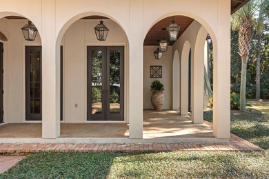 Tucked behind beautiful, private gates on a desirable corner lot on Sandestin Golf and Beach Resort - Raven in Florida - for sale on GolfHomes.com, golf home, golf lot