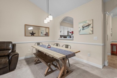 Welcome to this charming 2 bedroom, 2 bathroom top-floor condo on Barefoot Resort and Golf Club  in South Carolina - for sale on GolfHomes.com, golf home, golf lot