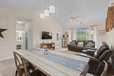 Welcome to this charming 2 bedroom, 2 bathroom top-floor condo on Barefoot Resort and Golf Club  in South Carolina - for sale on GolfHomes.com, golf home, golf lot