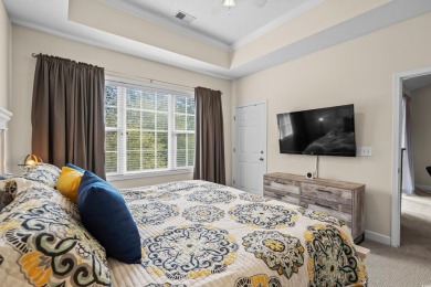 Welcome to this charming 2 bedroom, 2 bathroom top-floor condo on Barefoot Resort and Golf Club  in South Carolina - for sale on GolfHomes.com, golf home, golf lot