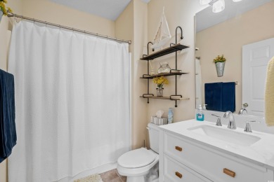 Welcome to this charming 2 bedroom, 2 bathroom top-floor condo on Barefoot Resort and Golf Club  in South Carolina - for sale on GolfHomes.com, golf home, golf lot