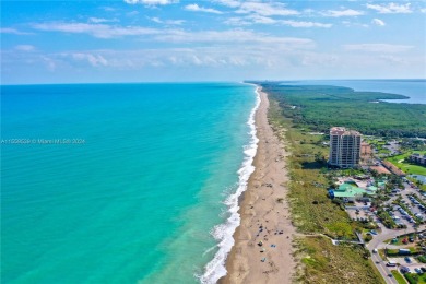 Discover the essence of beachside living in this recentlly on Ocean Village Golf Course in Florida - for sale on GolfHomes.com, golf home, golf lot