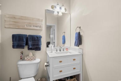 Welcome to this charming 2 bedroom, 2 bathroom top-floor condo on Barefoot Resort and Golf Club  in South Carolina - for sale on GolfHomes.com, golf home, golf lot