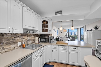 EXCEPTIONAL AVENTURA LIVING OVERLOOKING TURNBERRY GOLF COURSE on Turnberry Isle Resort and Club in Florida - for sale on GolfHomes.com, golf home, golf lot