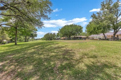 Discover this immaculate, move-in-ready home in the established on De Cordova Bend Country Club in Texas - for sale on GolfHomes.com, golf home, golf lot