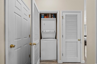 Welcome to this charming 2 bedroom, 2 bathroom top-floor condo on Barefoot Resort and Golf Club  in South Carolina - for sale on GolfHomes.com, golf home, golf lot
