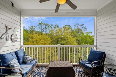 Welcome to this charming 2 bedroom, 2 bathroom top-floor condo on Barefoot Resort and Golf Club  in South Carolina - for sale on GolfHomes.com, golf home, golf lot