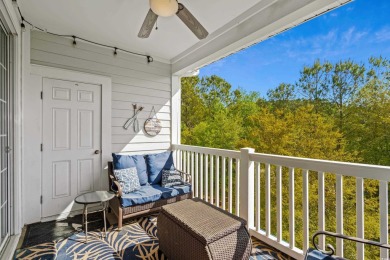 Welcome to this charming 2 bedroom, 2 bathroom top-floor condo on Barefoot Resort and Golf Club  in South Carolina - for sale on GolfHomes.com, golf home, golf lot