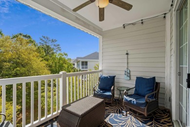 Welcome to this charming 2 bedroom, 2 bathroom top-floor condo on Barefoot Resort and Golf Club  in South Carolina - for sale on GolfHomes.com, golf home, golf lot