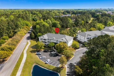Welcome to this charming 2 bedroom, 2 bathroom top-floor condo on Barefoot Resort and Golf Club  in South Carolina - for sale on GolfHomes.com, golf home, golf lot