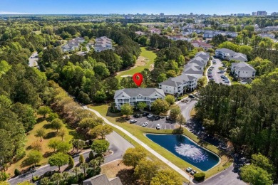 Welcome to this charming 2 bedroom, 2 bathroom top-floor condo on Barefoot Resort and Golf Club  in South Carolina - for sale on GolfHomes.com, golf home, golf lot