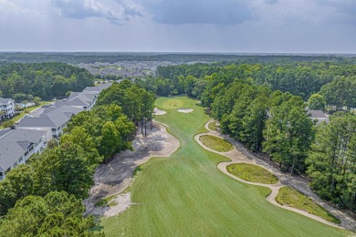 Welcome to this charming 2 bedroom, 2 bathroom top-floor condo on Barefoot Resort and Golf Club  in South Carolina - for sale on GolfHomes.com, golf home, golf lot