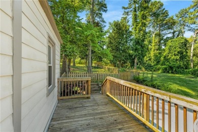 This adorable bungalow overlooks the Charlie Yates golf course on Charlie Yates Golf Course in Georgia - for sale on GolfHomes.com, golf home, golf lot