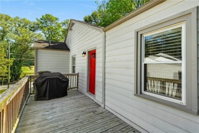 This adorable bungalow overlooks the Charlie Yates golf course on Charlie Yates Golf Course in Georgia - for sale on GolfHomes.com, golf home, golf lot