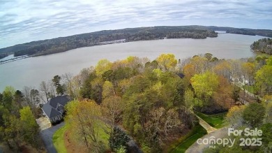 This Badin Lake waterfront lot is located in the prestigious on Old North State Club at Uwharrie Point Golf community in North Carolina - for sale on GolfHomes.com, golf home, golf lot