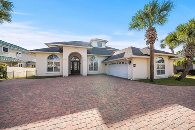 Tucked behind the private gates of the Bay Point community, this on Bay Point Resort Golf Club in Florida - for sale on GolfHomes.com, golf home, golf lot