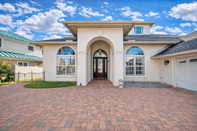 Tucked behind the private gates of the Bay Point community, this on Bay Point Resort Golf Club in Florida - for sale on GolfHomes.com, golf home, golf lot