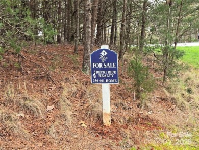 This Badin Lake waterfront lot is located in the prestigious on Old North State Club at Uwharrie Point Golf community in North Carolina - for sale on GolfHomes.com, golf home, golf lot