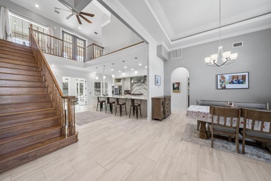 Tucked behind the private gates of the Bay Point community, this on Bay Point Resort Golf Club in Florida - for sale on GolfHomes.com, golf home, golf lot