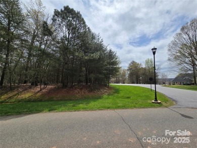 This Badin Lake waterfront lot is located in the prestigious on Old North State Club at Uwharrie Point Golf community in North Carolina - for sale on GolfHomes.com, golf home, golf lot