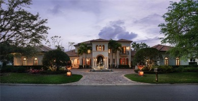 Inspired by a Tuscan vision, this stunning residence was built on Lake Nona Golf Club, Inc. in Florida - for sale on GolfHomes.com, golf home, golf lot