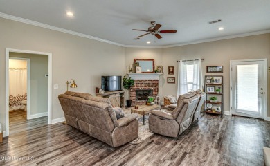 A must see!   Beautiful finishes throughout this unique floor on Patrick Farms Golf Club in Mississippi - for sale on GolfHomes.com, golf home, golf lot