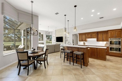 Schedule a private showing to tour this 4-bedroom, 4-bath pool on Laurel Oak Country Club in Florida - for sale on GolfHomes.com, golf home, golf lot