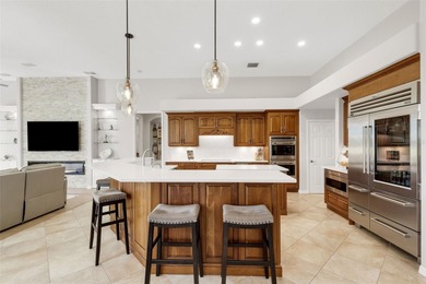 Schedule a private showing to tour this 4-bedroom, 4-bath pool on Laurel Oak Country Club in Florida - for sale on GolfHomes.com, golf home, golf lot