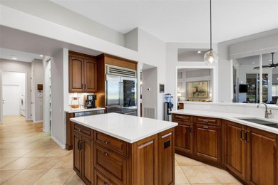 Schedule a private showing to tour this 4-bedroom, 4-bath pool on Laurel Oak Country Club in Florida - for sale on GolfHomes.com, golf home, golf lot