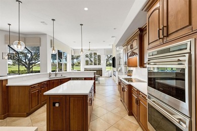 Schedule a private showing to tour this 4-bedroom, 4-bath pool on Laurel Oak Country Club in Florida - for sale on GolfHomes.com, golf home, golf lot