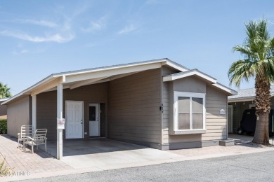 This cozy 2B/2B home Is located In the Golf Course community Of on Pueblo Golf Course in Arizona - for sale on GolfHomes.com, golf home, golf lot