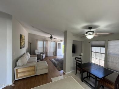 This cozy 2B/2B home Is located In the Golf Course community Of on Pueblo Golf Course in Arizona - for sale on GolfHomes.com, golf home, golf lot
