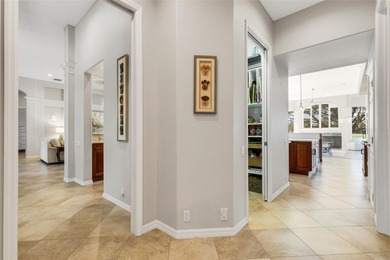 Schedule a private showing to tour this 4-bedroom, 4-bath pool on Laurel Oak Country Club in Florida - for sale on GolfHomes.com, golf home, golf lot