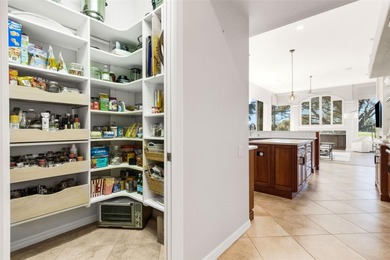 Schedule a private showing to tour this 4-bedroom, 4-bath pool on Laurel Oak Country Club in Florida - for sale on GolfHomes.com, golf home, golf lot