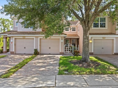 Enjoy Florida living in this delightful first-floor, end unit on ChampionsGate Golf Resort in Florida - for sale on GolfHomes.com, golf home, golf lot