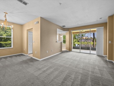 Enjoy Florida living in this delightful first-floor, end unit on ChampionsGate Golf Resort in Florida - for sale on GolfHomes.com, golf home, golf lot