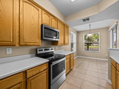 Enjoy Florida living in this delightful first-floor, end unit on ChampionsGate Golf Resort in Florida - for sale on GolfHomes.com, golf home, golf lot