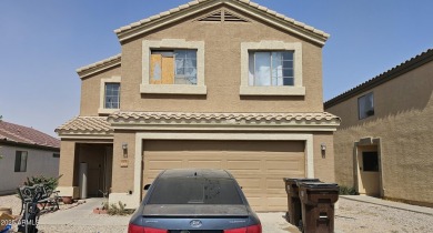 Investor special! Spacious 5-bedroom, 2.5-bath fixer-upper on Oasis Golf Club in Arizona - for sale on GolfHomes.com, golf home, golf lot