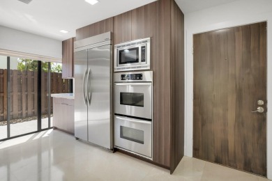 This remodeled two-story villa is a must-see. It's been on Boca Lago Golf and Country Club in Florida - for sale on GolfHomes.com, golf home, golf lot