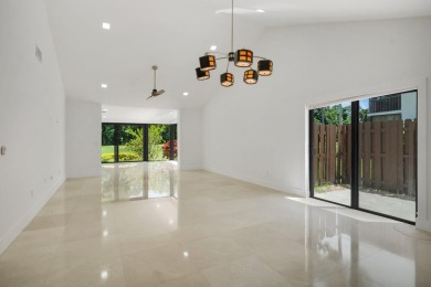 This remodeled two-story villa is a must-see. It's been on Boca Lago Golf and Country Club in Florida - for sale on GolfHomes.com, golf home, golf lot