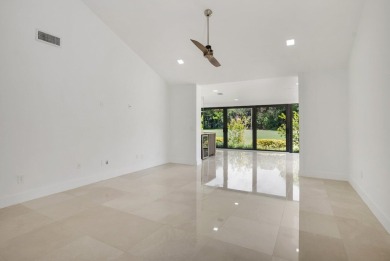 This remodeled two-story villa is a must-see. It's been on Boca Lago Golf and Country Club in Florida - for sale on GolfHomes.com, golf home, golf lot